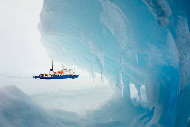 This image taken by passenger Andrew Peacock shows the 'MV Akademik Shokalskiy' stuck in the ice off East Antarctica as it waits to be rescued. AFP
