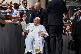 Pope Francis waves as he leaves at the end of the weekly general audience in St Peter's Square. He will undergo an operation for an abdominal hernia at a hospital in Rome, where he is expected to stay for "several days". AFP