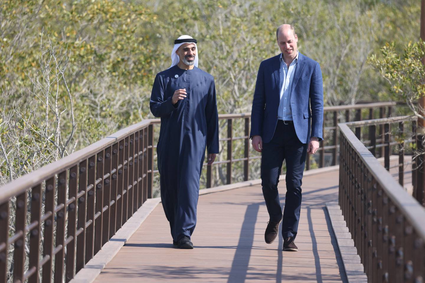 Prince William speaks with Sheikh Khaled bin Mohamed, chairman of Abu Dhabi Executive Office and member of the Abu Dhabi Executive Council, as he visits Jubail Mangrove Park. Reuters