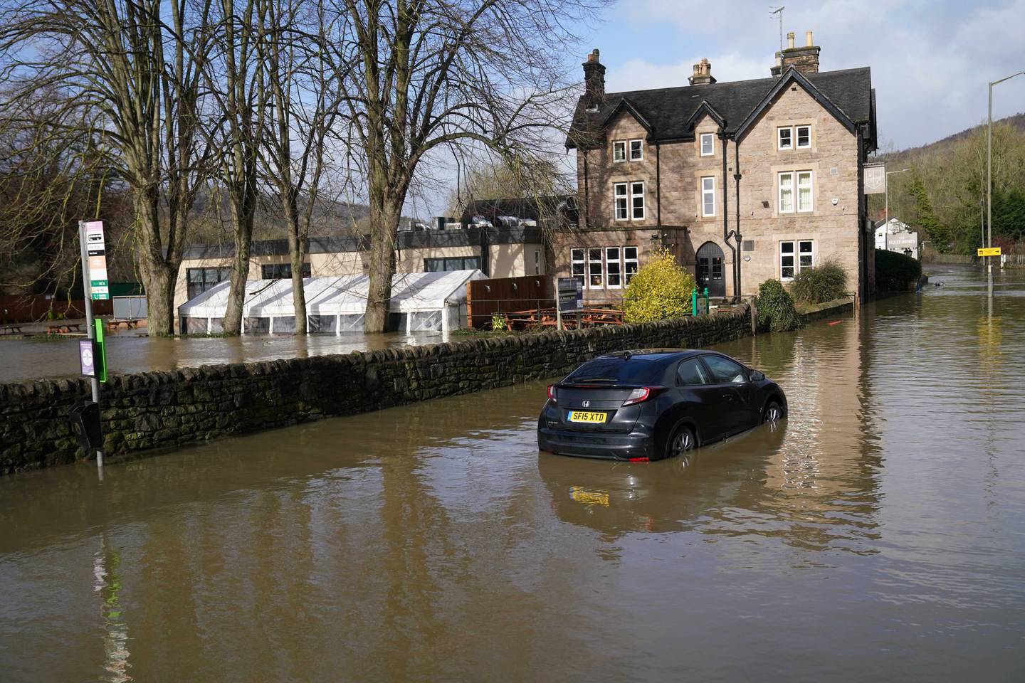 A car stranded in flood waters in Belper, Derbyshire, on Monday after Storm Franklin brought downpours and strong winds. PA