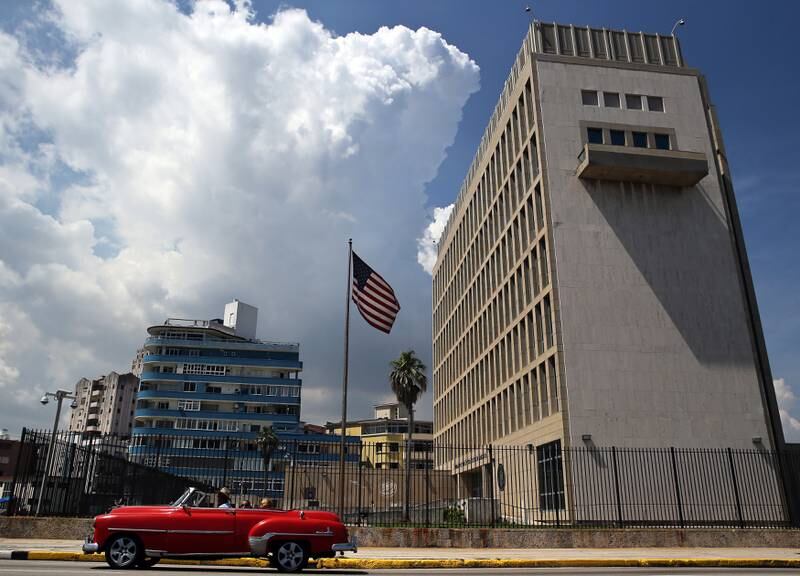 epa06134953 (FILE) - A classic car passes in front of the US embassy in Havana, Cuba, 16 June 2017 (reissued 10 August 2017). Media outlets report that the US State Department has expelled two diplomats from the Cuban Embassy in Washington, following an alleged 'acoustic attack' on employees at the US embassy in Havana. Sonic devices were reportedly used in the attack that left at least two with serious health problems.  EPA/Alejandro Ernesto