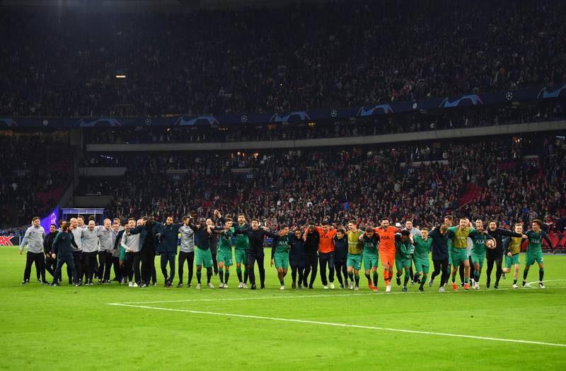 AMSTERDAM, NETHERLANDS - MAY 08: The Tottenham Hotspur team celebrate victory after the UEFA Champions League Semi Final second leg match between Ajax and Tottenham Hotspur at the Johan Cruyff Arena on May 08, 2019 in Amsterdam, Netherlands. (Photo by Dan Mullan/Getty Images )