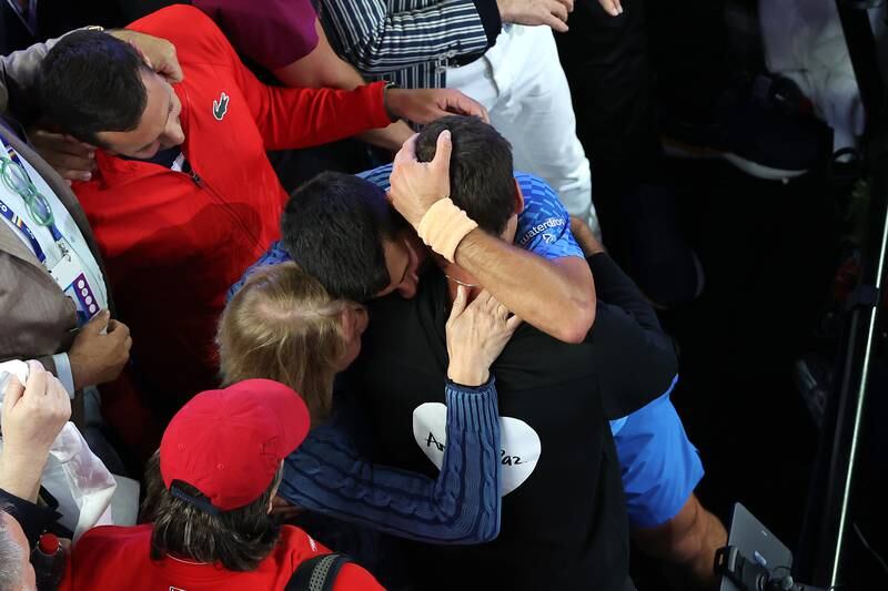 Novak Djokovic celebrates with his team and family. Getty 