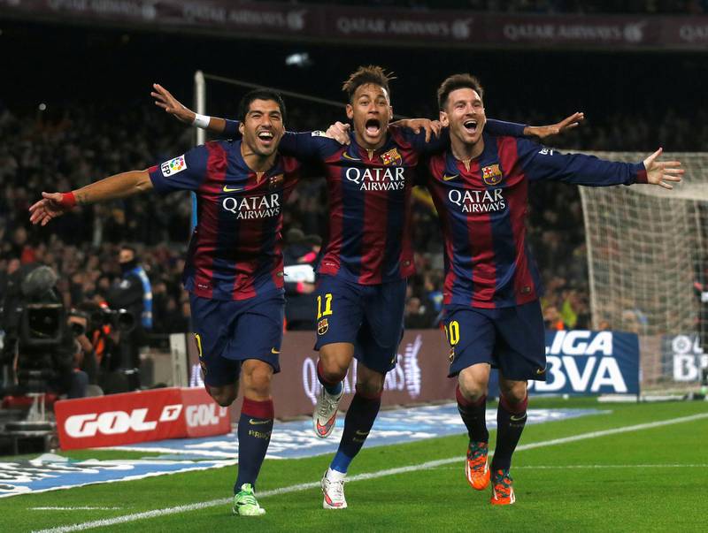 FILE PHOTO: (L-R) Barcelona's Luis Suarez, Neymar and Lionel Messi celebrate a goal against Atletico Madrid during their Spanish First Division soccer match at Camp Nou stadium in Barcelona January 11, 2015. REUTERS/Albert Gea/File Photo