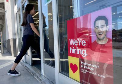 A recruitment sign posted in a Target store in Sausalito, California. Nonfarm payrolls in the US rose by about 150,000 in October, the Bureau of Labour Statistics reported on Friday, slowing more than expected. AFP