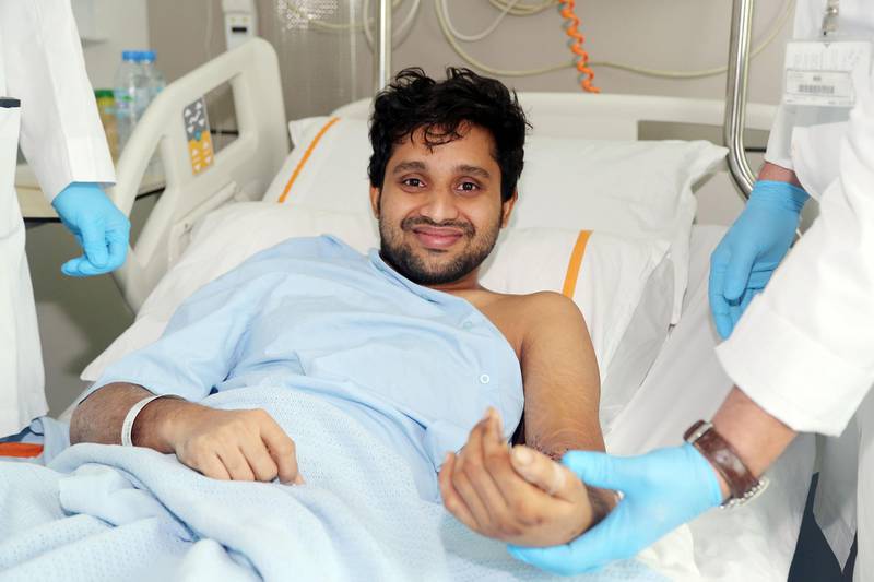 Lift engineer Flertin Baby, 33, recovering at Rashid Hospital after his left forearm was detached in a freak lift accident. Courtesy: DHA