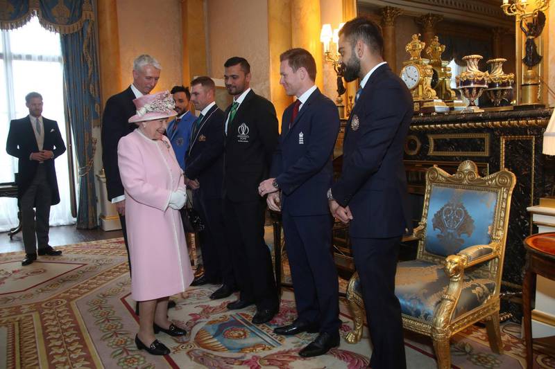 The Queen chats to some of the captains. AFP