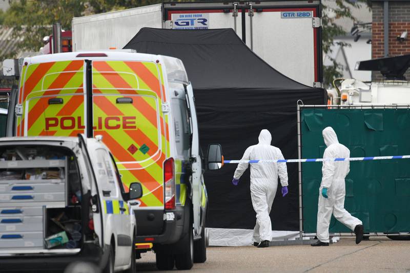 THURROCK, ENGLAND - OCTOBER 23: A Police forensic investigation team are parked near the site where 39 bodies were discovered in the back of a lorry on October 23, 2019 in Thurrock, England. The lorry was discovered early Wednesday morning in Waterglade Industrial Park on Eastern Avenue in the town of Grays. Authorities said they believed the lorry originated in Bulgaria. (Photo by Leon Neal/Getty Images)