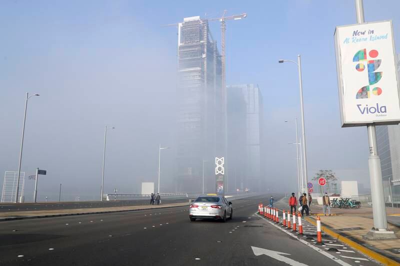 Fog also affected Reem Island. Drivers were told not to exceed 80kph on a number of major roads as visibility was reduced to less than 1,000 metres. Khushnum Bhandari / The National