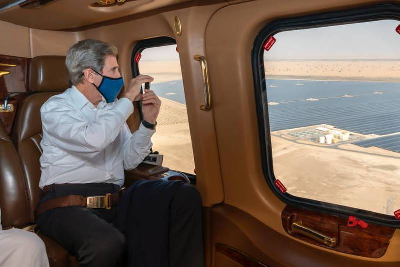US climate envoy John Kerry is given a helicopter tour of Noor solar park, outside Abu Dhabi on Saturday. Courtesy: Office of the UAE Special Envoy for Climate Change