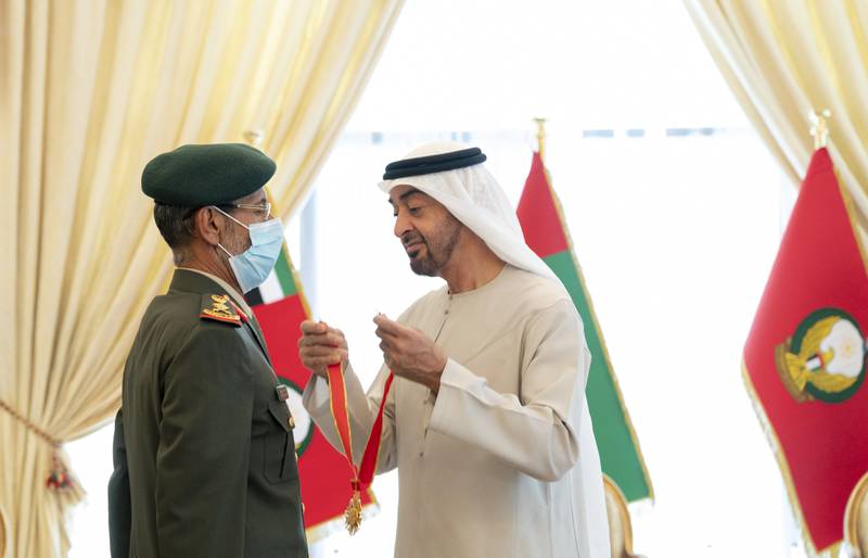 Sheikh Mohamed bin Zayed, Crown Prince of Abu Dhabi and Deputy Supreme Commander of the UAE Armed Forces, right, presents the Zayed bin Sultan Al Nahyan Military Order to Lt Gen Hamad Al Romaithi, Chief of Staff of UAE Armed Forces. All photos: MOPA