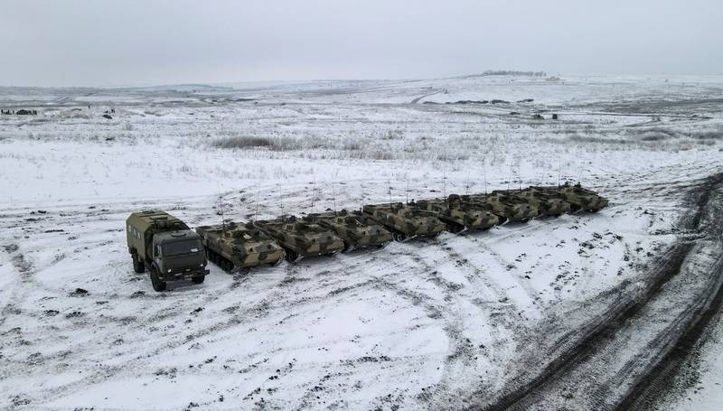 Russian BMP-3 infantry fighting vehicles and a truck during drills held by the armed forces on Thursday. Reuters
