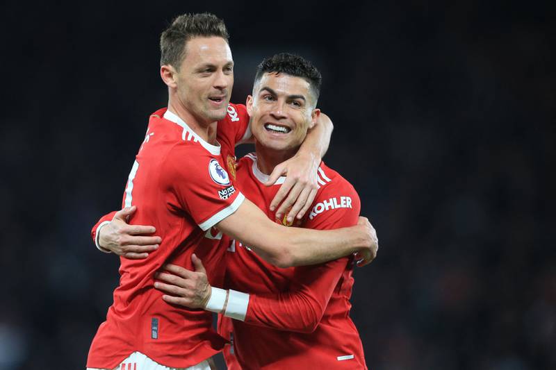 United's Cristiano Ronaldo celebrates with Nemanja Matic after scoring against Chelsea. AFP