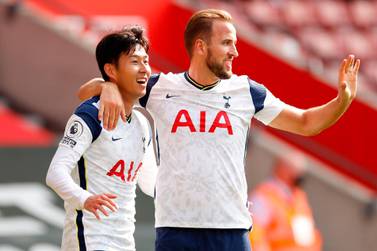 Tottenham Hotspur's South Korean striker Son Heung-Min celebrates with Tottenham Hotspur's English striker Harry Kane (R) after scoring his and their third goal during the English Premier League football match between Southampton and Tottenham Hotspur at St Mary's Stadium in Southampton, southern England on September 20, 2020. RESTRICTED TO EDITORIAL USE. No use with unauthorized audio, video, data, fixture lists, club/league logos or 'live' services. Online in-match use limited to 120 images. An additional 40 images may be used in extra time. No video emulation. Social media in-match use limited to 120 images. An additional 40 images may be used in extra time. No use in betting publications, games or single club/league/player publications. / AFP / POOL / ANDREW BOYERS / RESTRICTED TO EDITORIAL USE. No use with unauthorized audio, video, data, fixture lists, club/league logos or 'live' services. Online in-match use limited to 120 images. An additional 40 images may be used in extra time. No video emulation. Social media in-match use limited to 120 images. An additional 40 images may be used in extra time. No use in betting publications, games or single club/league/player publications.