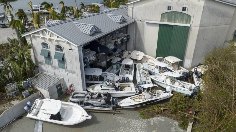 Boats left in a pile at the Port Sanibel Marina Motel by the storm surge. AP