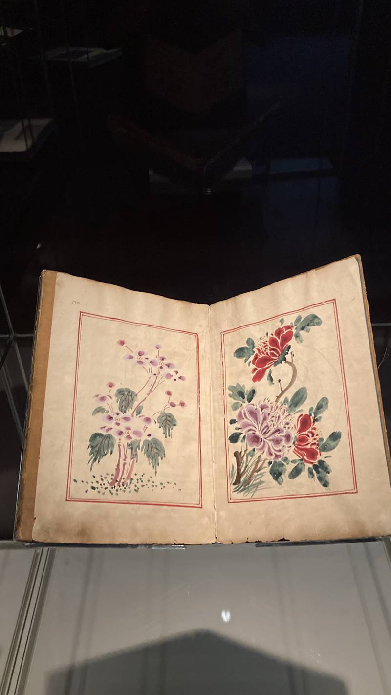 Floral designs on a Quranic manuscript from China. Razmig Bedirian / The National