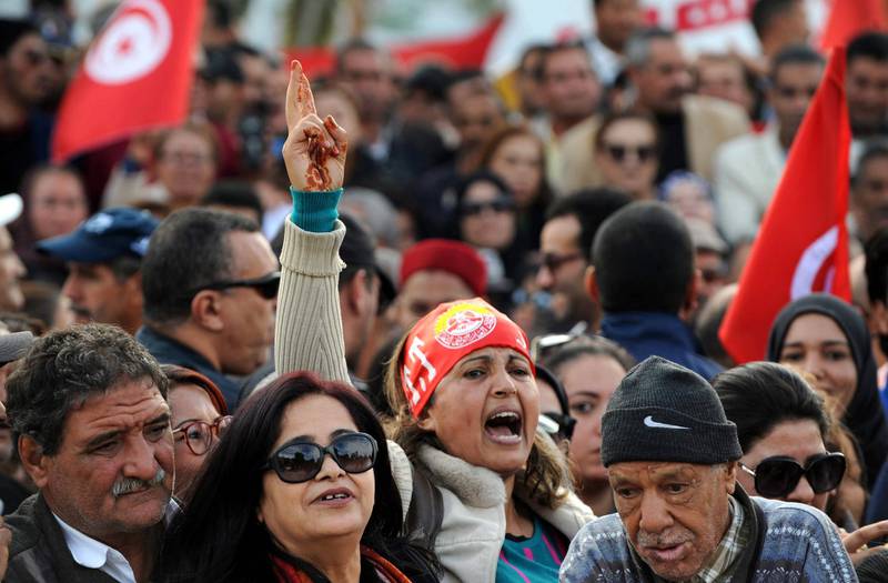epa07183174 People protest during a general strike in Tunis, Tunisia, 22 November 2018. Some 670 thousand civil servants went on strike on 22 November 2018 after the Tunisian General Labor Union (UGTT) and the Tunisia government failed to reach an agreement to increase the salaries by the government. Protesters said that the loan by the International Monetary Fund (IMF) to Tunisia was one of the main factors of the government refusal. Tunisia agreed in 2016 a 2.8 billion US dollars loan from the IMF. The general strike included all public sectors subjected to the civil service law, with minimum level of service guaranteed in vital sectors like emergency services.  EPA/STR