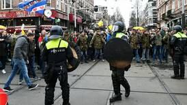 Arrests and clashes as thousands protest against Dutch Covid measures
