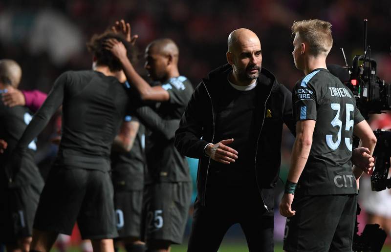 BRISTOL, ENGLAND - JANUARY 23:  Manchester City manager Pep Guardiola congratulates Oleksandr Zinchenko after the Carabao Cup Semi-Final: Second Leg match between Bristol City and Manchester City at Ashton Gate on January 23, 2018 in Bristol, England.  (Photo by Stu Forster/Getty Images)