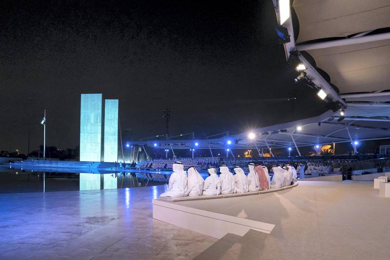 ABU DHABI, UNITED ARAB EMIRATES - November 30, 2019:  Guests attend a Commemoration Day ceremony at Wahat Al Karama, a memorial dedicated to the memory of UAE’s National Heroes in honour of their sacrifice and in recognition of their heroism.

( Mohamed Al Hammadi / Ministry of Presidential Affairs )
---