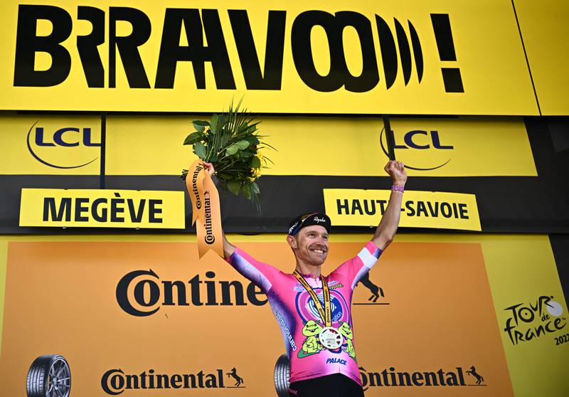 EF Education-Easypost rider Magnus Cort celebrates on the podium after winning Stage 10. AFP