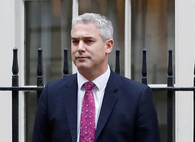 FILE - In this file photo dated Wednesday, Nov. 22, 2017, Economic Secretary to the Treasury Stephen Barclay poses outside 11 Downing Street in London.  Barclay on Friday Nov. 16, 2018, has been promoted to Brexit Secretary. (AP Photo/Kirsty Wigglesworth, FILE)