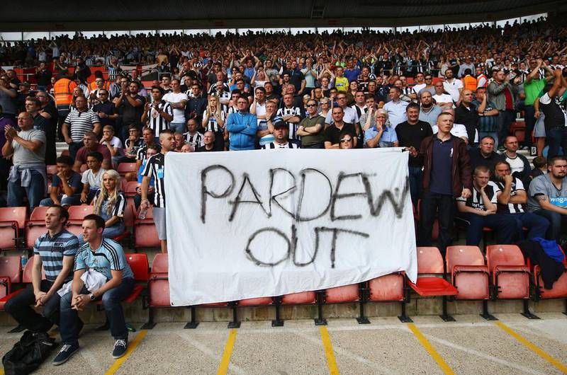 Newcastle United fans hold a ‘Pardew Out’ banner after their discontent was further fanned by a 4-0 loss at Southampton which left the visitors bottom of the table. Richard Heathcote / Getty Images