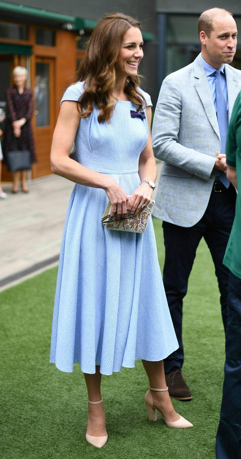 Wearing Emilia Wickstead, Kate, Duchess of Cambridge arrive ahead of the Men's Singles Final on day thirteen of the Wimbledon Championships at the All England Lawn Tennis and Croquet Club, in London, Sunday, July 14, 2019. Photo: AP