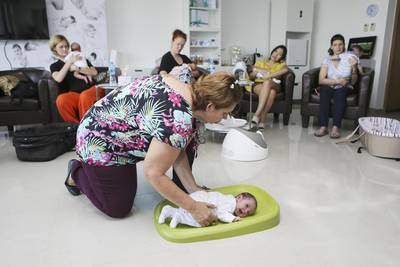 Cecile de Scally, the co-founder of Baby Senses, leads a demonstration at its centre in Jumeirah Lakes Towers. Sarah Dea / The National