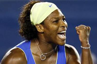 Serena Williams shows her delight at reaching the semi-finals of the women's Australian Open.
