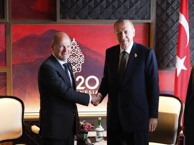 Mr Scholz, left, and Turkish President Recep Tayyip Erdogan during a bilateral meeting. EPA