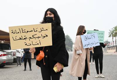 'Just as we have a duty towards you, you have a duty towards us' reads this business owner's placard displayed at a Kuwait City protest against the closure of small businesses as an anti-coronavirus measure. EPA