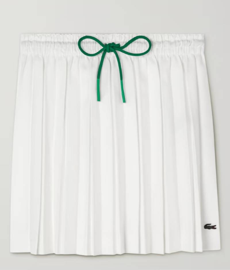French sports brand Lacoste delivers a fashion forehand with its appliqued pleated pique tennis skirt. Dh680.54, www.net-a-porter.com. Photo: Lacoste