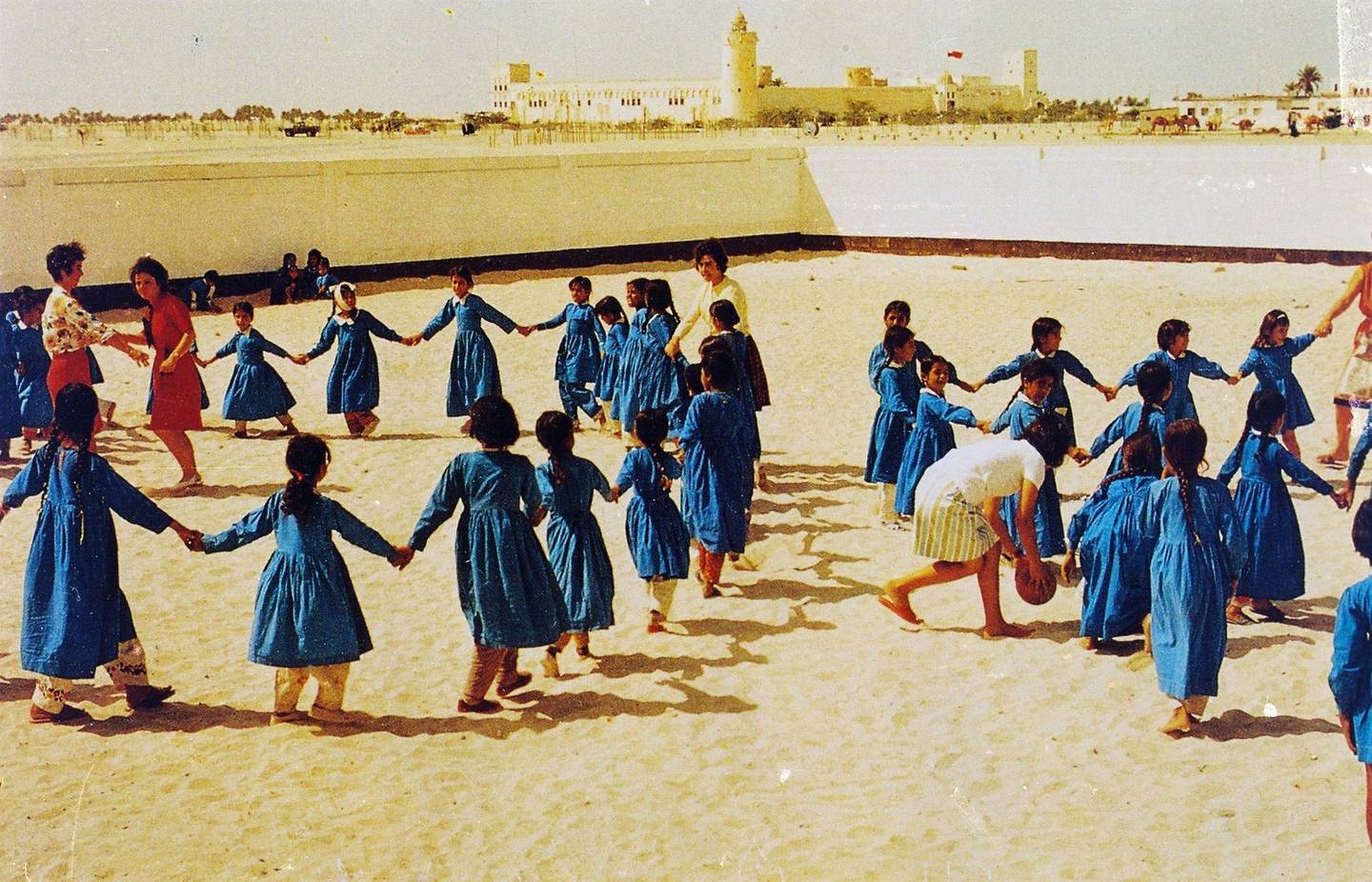 Pupils playing at the first girls school in Abu Dhabi which opened around 1963 near Qasr Al Hosn.