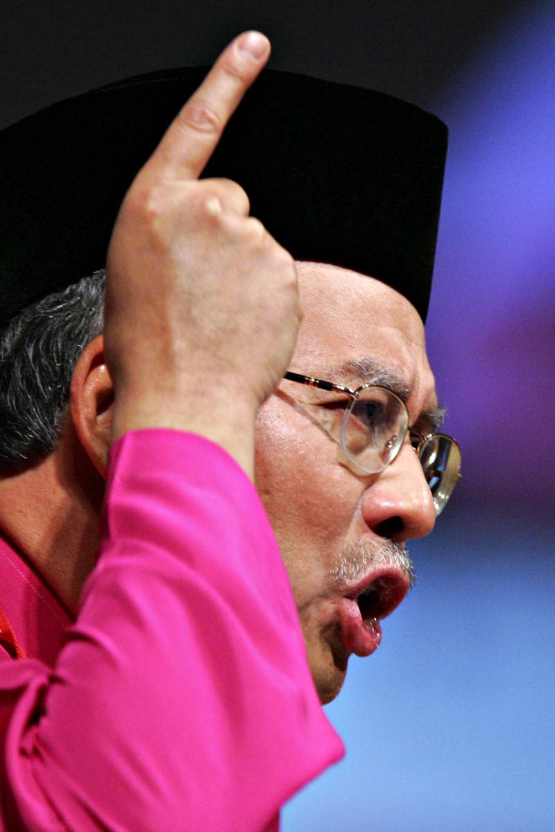 Najib Razak, then vice president of the United Malays National Organisation, gestures during his speech on the final day of the party's annual general assembly in Kuala Lumpur in 2005. AFP