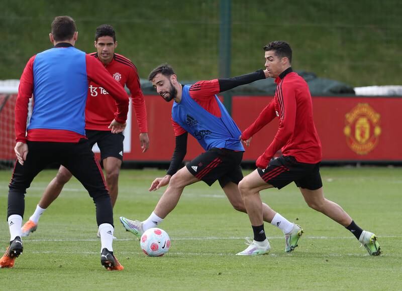 Bruno Fernandes and Cristiano Ronaldo during Manchester United training at Carrington ahead of Thursday's Premier League game against Chelsea at Old Trafford. All photos by Getty