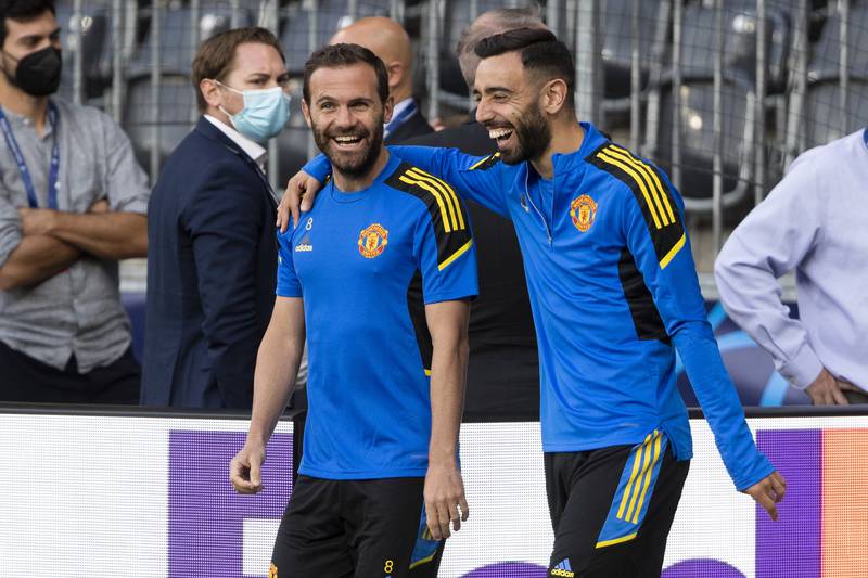 United's Juan Mata and Bruno Fernandes. AP