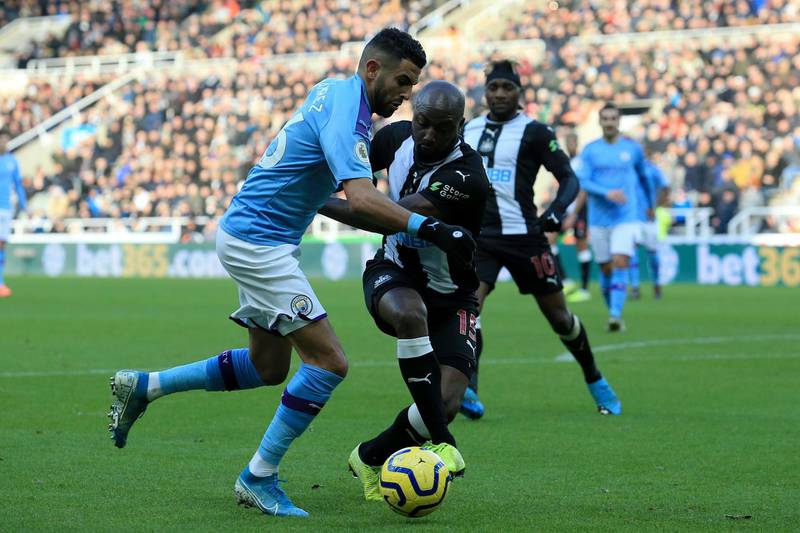 Manchester City's Algerian midfielder Riyad Mahrez (L) vies with Newcastle United's Dutch defender Jetro Willems. AFP