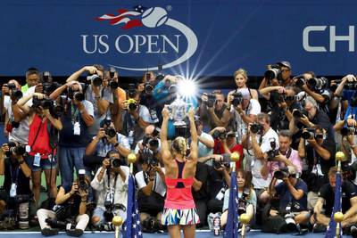 Angelique Kerber of Germany kisses the trophy. Michael Heiman / Getty Images