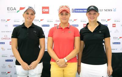 Charley Hull, centre, poses with Nanna Koerstz Madsen and Emily Kristine Pedersen in Dubai on Monday. David Cannon / Getty Images

