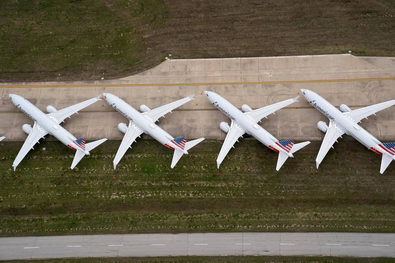 American Airlines passenger planes crowd a runway where they are parked due to flight reductions to slow the spread of coronavirus disease. Reuters