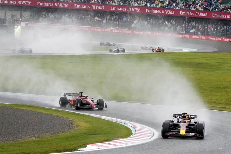 Max Verstappen leads the race after a restart during the Japanese Grand Prix at the Suzuka. EPA