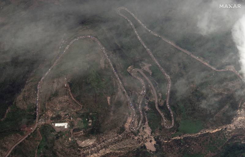 A satellite image shows a long traffic jam of vehicles along the Lachin corridor. Maxar Technologies/Reuters
