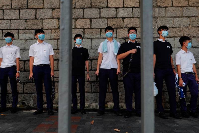 Students form a human chain outside a park in Hong Kong, China. AP Photo