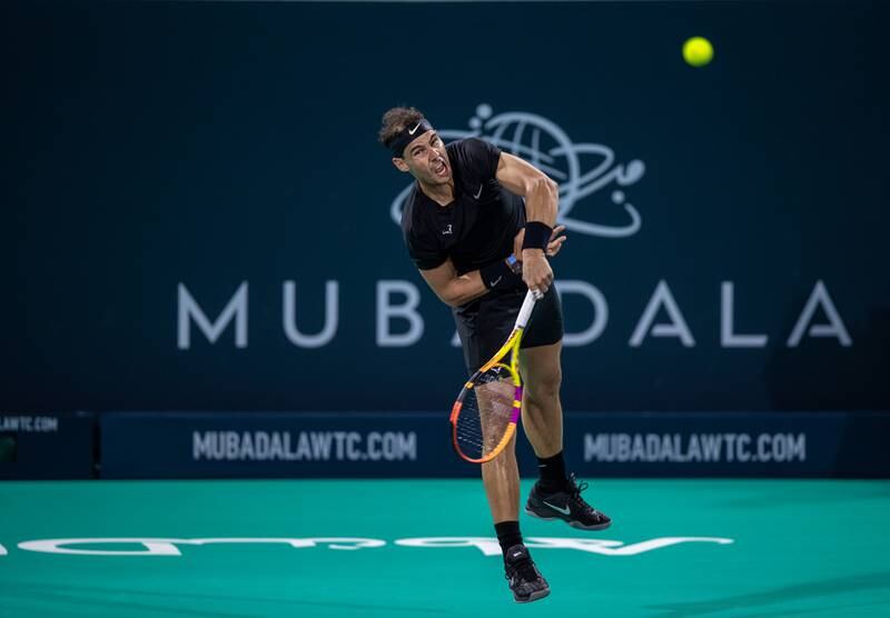 Rafael Nadal serves to Andy Murray at the Mubadala World Tennis Championship. Victor Besa / The National