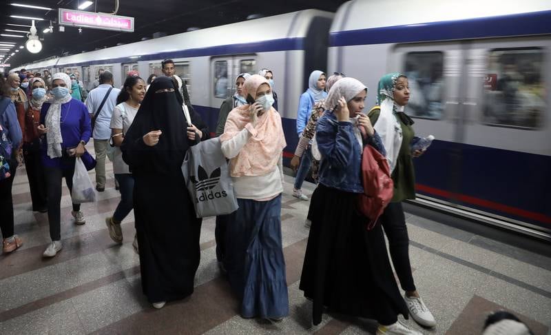Passengers at Sadat metro station, Cairo, Egypt. The country has recently stepped up measures to control the spread of Covid-19. EPA