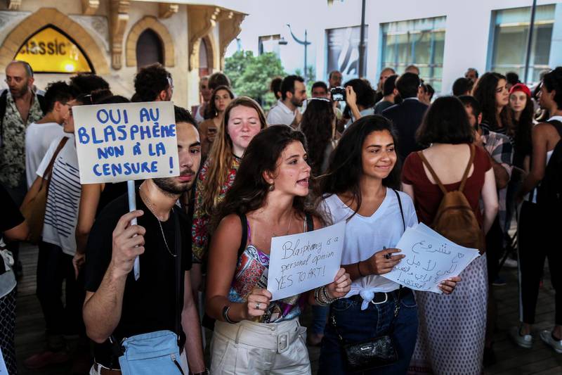 Lebanese activists supporters of Mashrou' Leila band carry placards during a protest in solidarity with the Lebanese band Mashrou' Leila after the band;s concert was cancelled at the Byblos International Festival.  EPA
