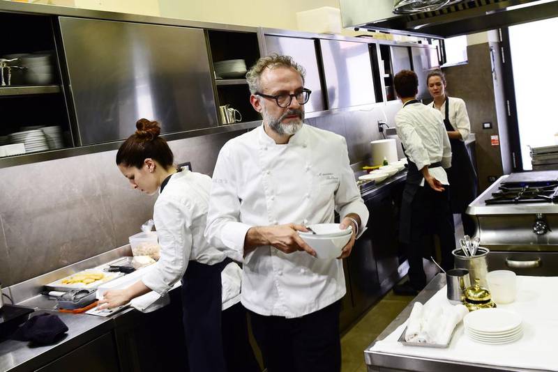 Italian chef Massimo Bottura working in the kitchen of his restaurant Osteria Francescana in Modena. Giuseppe Cacace / AFP