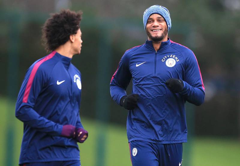 MANCHESTER, ENGLAND - NOVEMBER 27:  Leroy Sane jokes with Vincent Kompany during training at Manchester City Football Academy on November 27, 2017 in Manchester, England.  (Photo by Victoria Haydn/Man City via Getty Images)