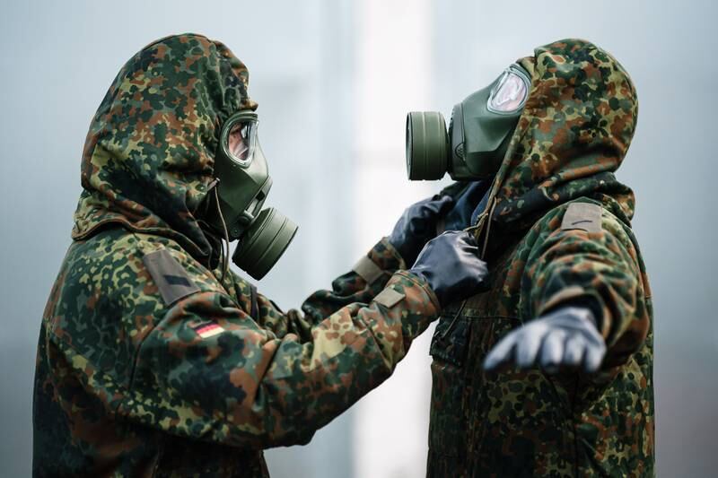 Soldiers on an exercise wearing gas masks during a visit by Defence Minister Boris Pistorius in Mahlwinkel, Germany.  EPA
